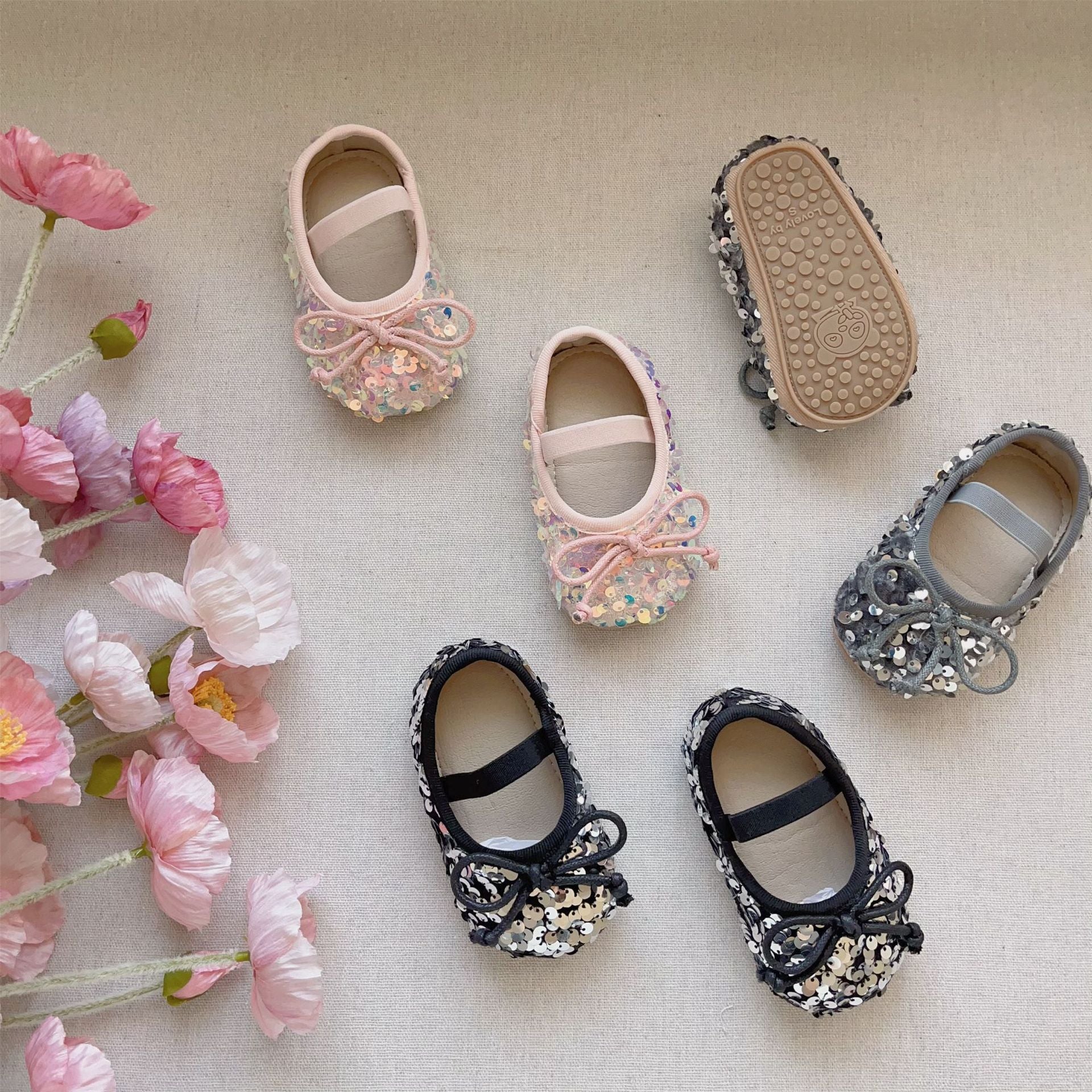 Autumn Baby Girl Sequin Design Toddler Soft-Sole shoes in black, pink, and grey with patchwork design.