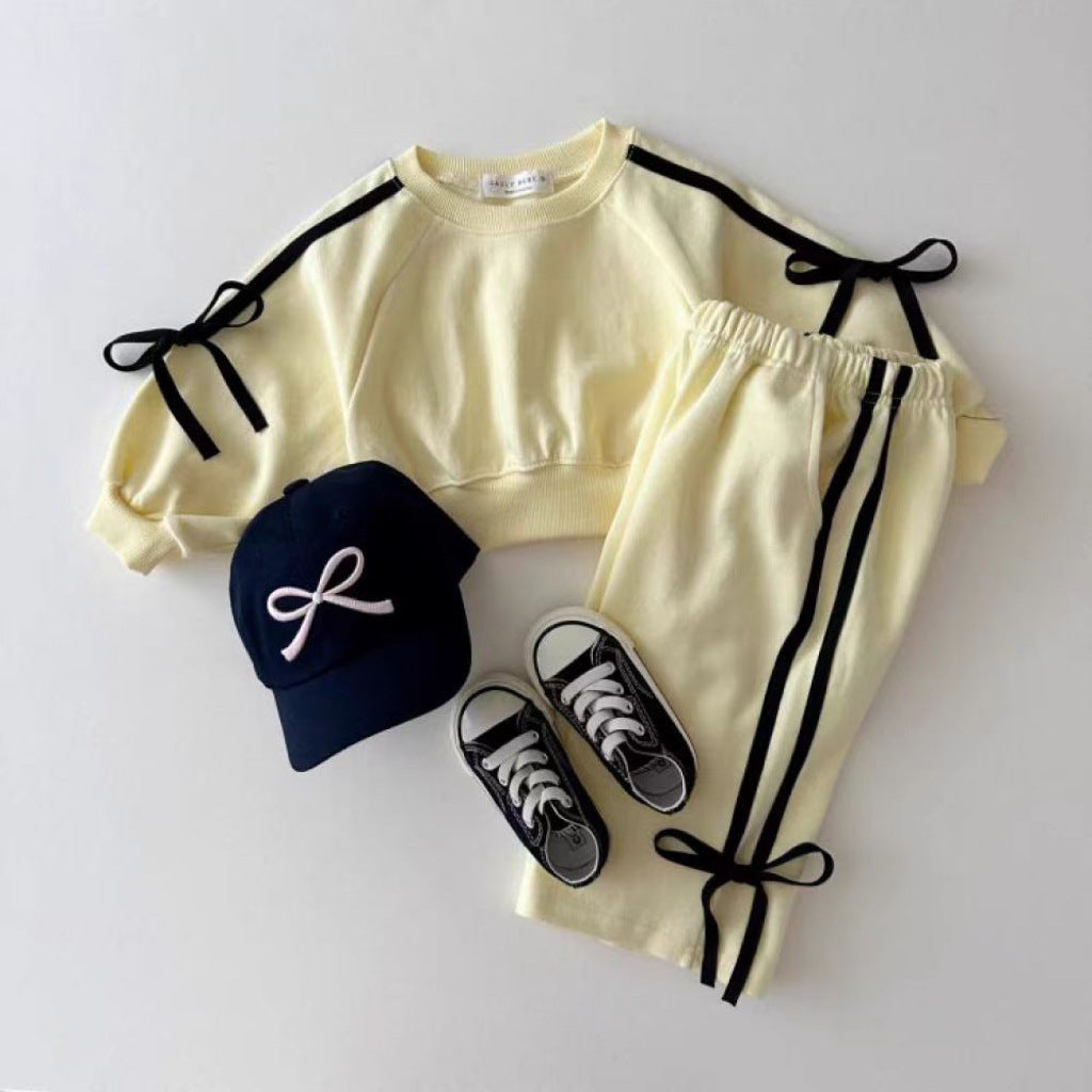 Autumn Baby Kids Girls Casual Bows Tied Pullover and Pants in pink and yellow, featuring a cute patchwork design.