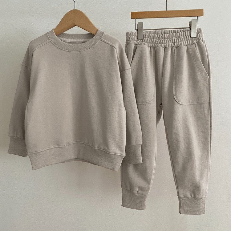Autumn Baby Kids Unisex Casual Solid Color Long Sleeves Pullover in various colors, showcasing its soft cotton material and stylish design.