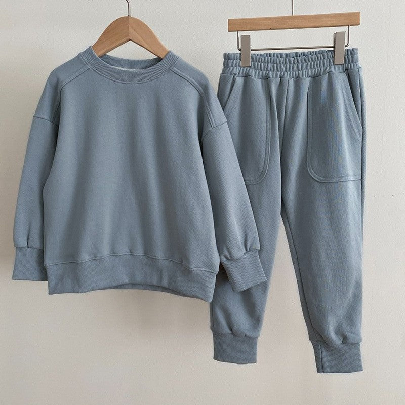 Autumn Baby Kids Unisex Casual Solid Color Long Sleeves Pullover in various colors, showcasing its soft cotton material and stylish design.
