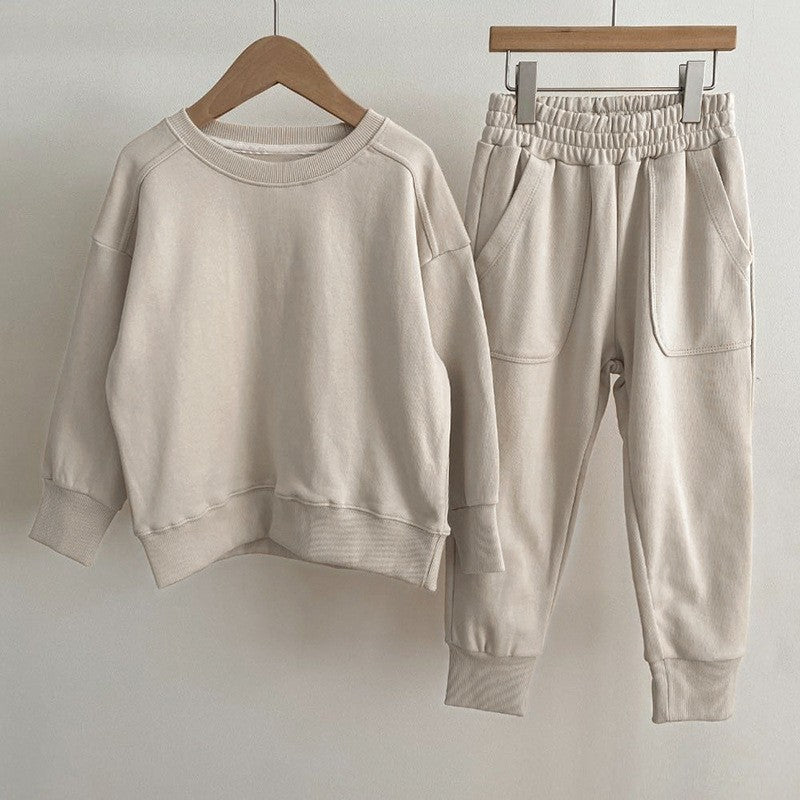 Autumn Baby Kids Unisex Casual Solid Color Long Sleeves Pullover in various colors, showcasing its soft cotton material and stylish design.
