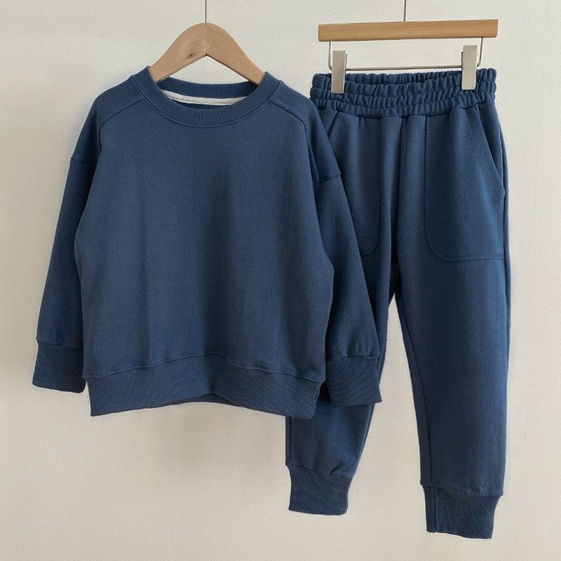 Autumn Baby Kids Unisex Casual Solid Color Long Sleeves Pullover in various colors, showcasing its soft cotton material and stylish design.