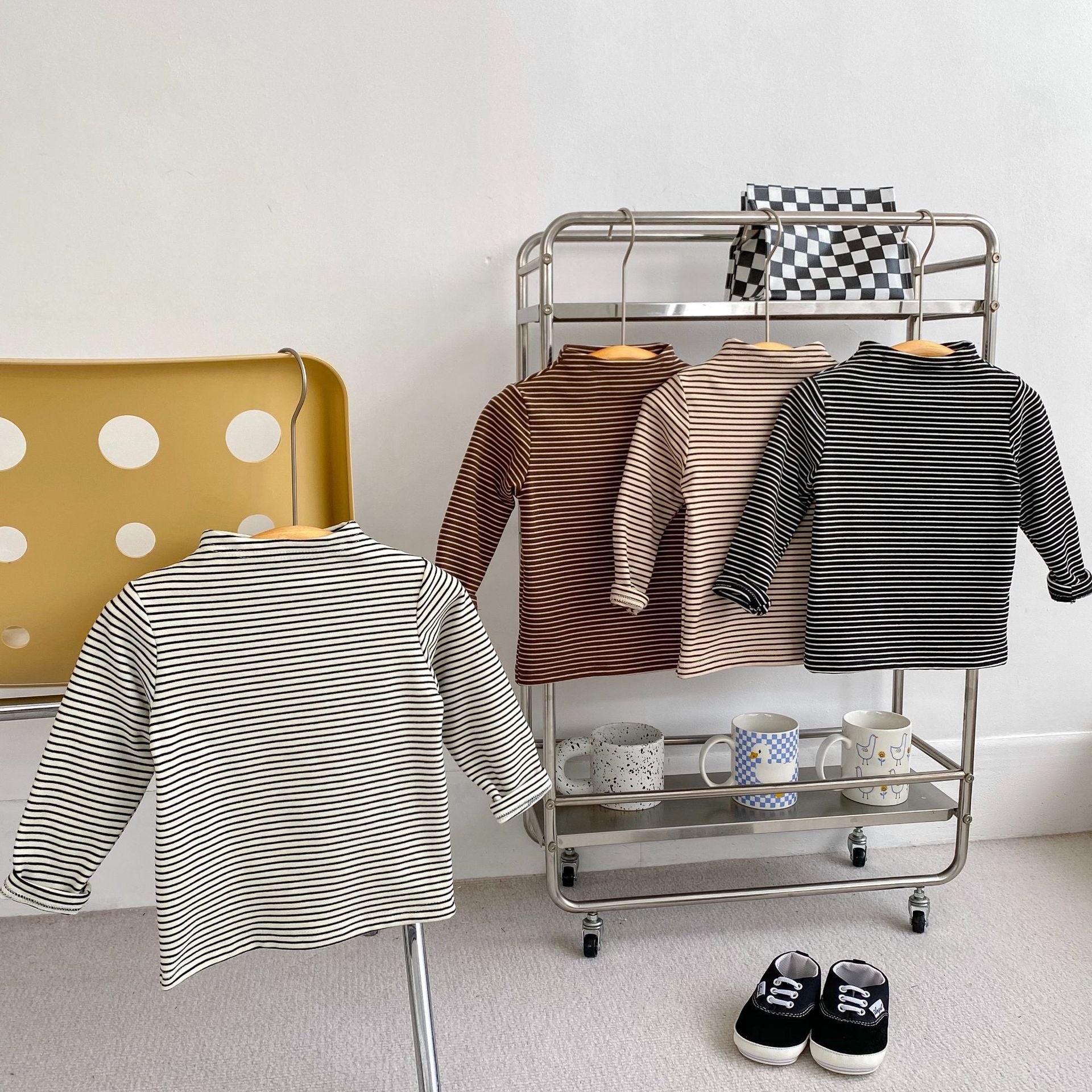 Autumn Baby Kids Unisex Striped Long Sleeves Turtle Neck Top Pullover in white, black, khaki, and brown colors, showcasing its stylish striped pattern.