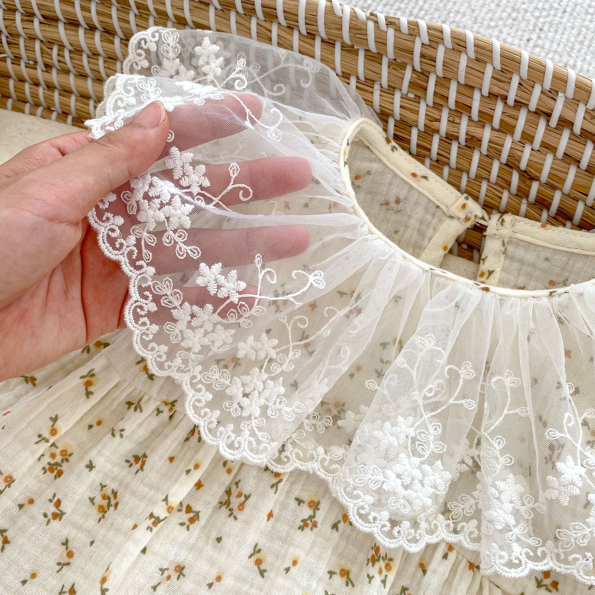 Autumn Ditsy Flower Pattern Mesh Collar Onesies in apricot color for baby girls, featuring a floral design and soft cotton material.