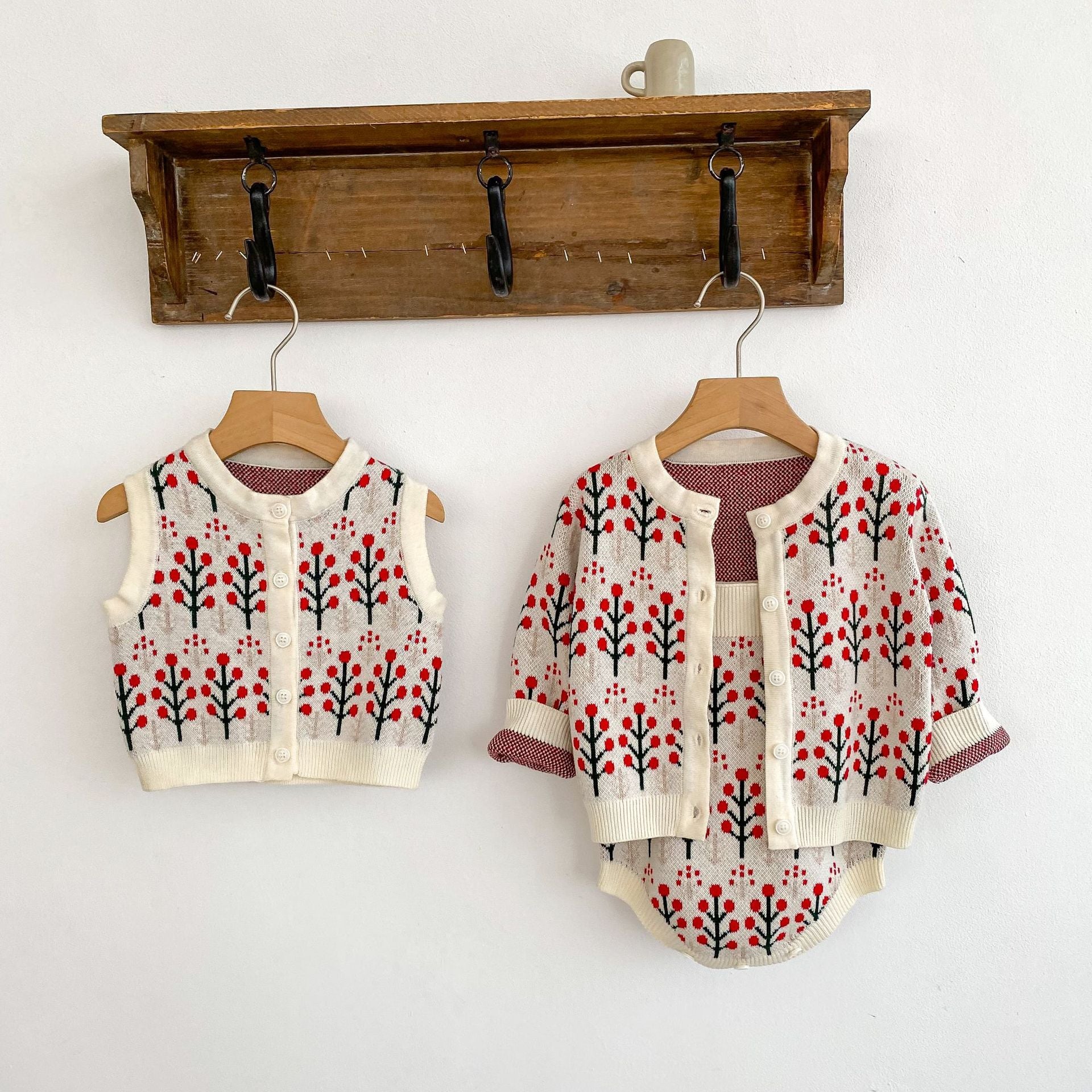 Autumn Flower Pattern Knitwears Cardigan and Onesies for baby girls in white, beige, and apricot colors, showcasing floral designs.
