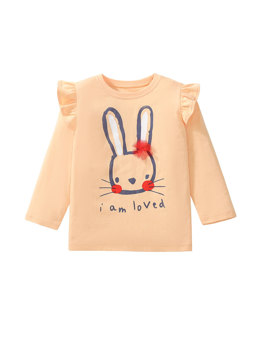 A cute long-sleeved t-shirt for girls featuring a rabbit cartoon pattern, made from soft cotton in apricot color.