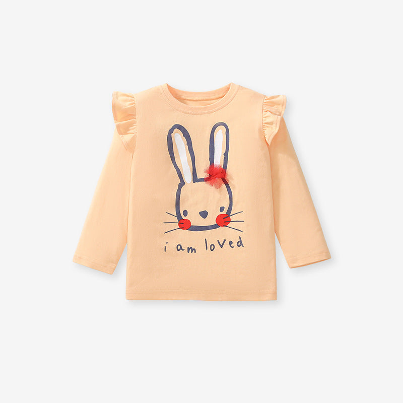 A cute long-sleeved t-shirt for girls featuring a rabbit cartoon pattern, made from soft cotton in apricot color.