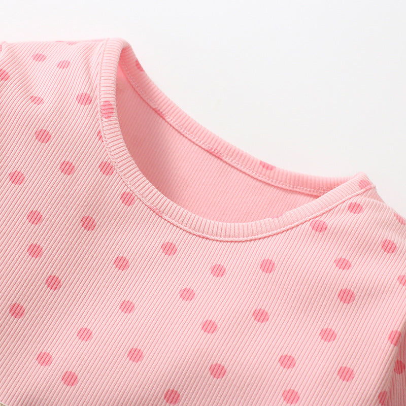 A vibrant pink long sleeve dress for girls featuring a mesh patched design, perfect for autumn wear.