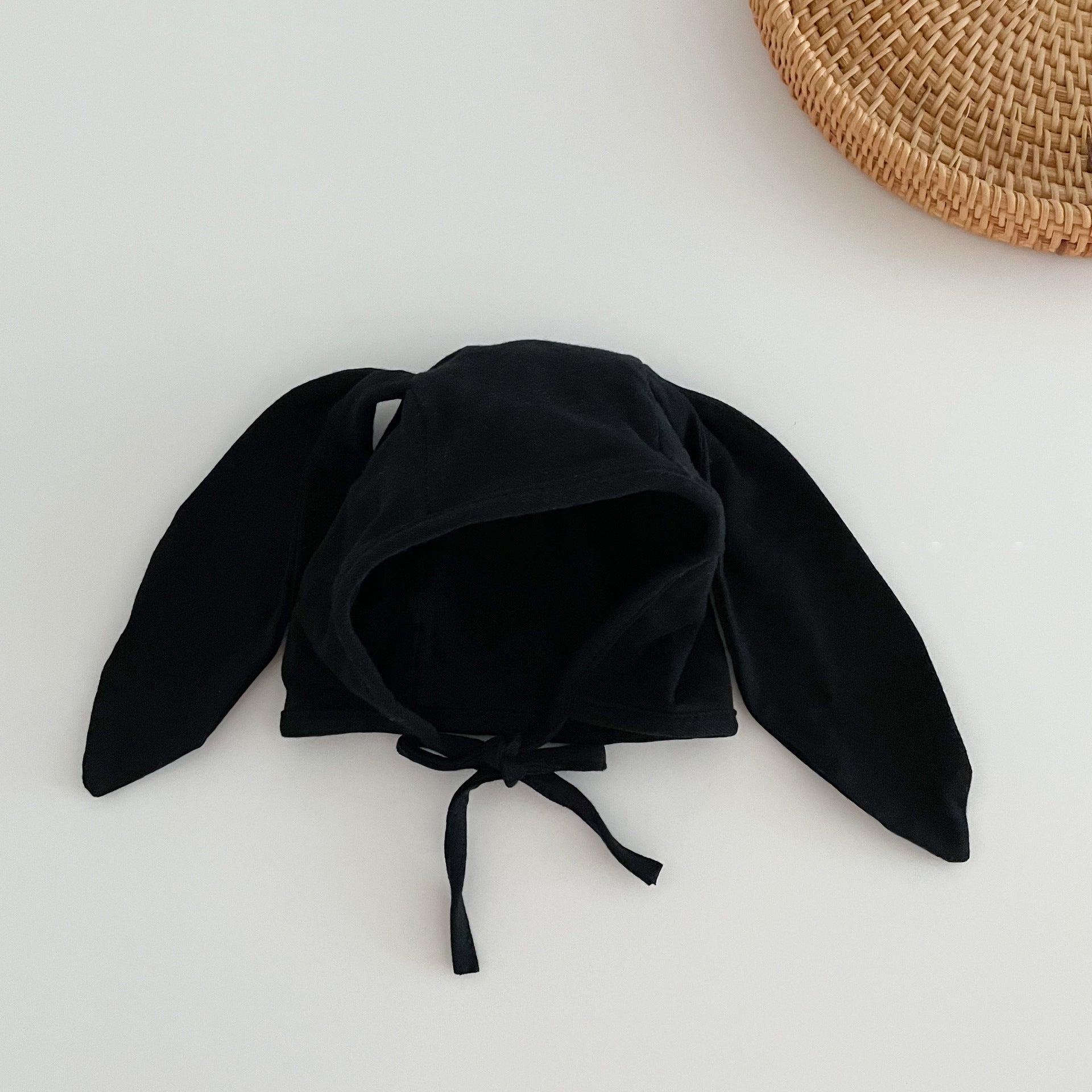 Adorable Autumn Rabbits Design Hat for Baby with tie straps, available in various colors, made from soft cotton blend material.