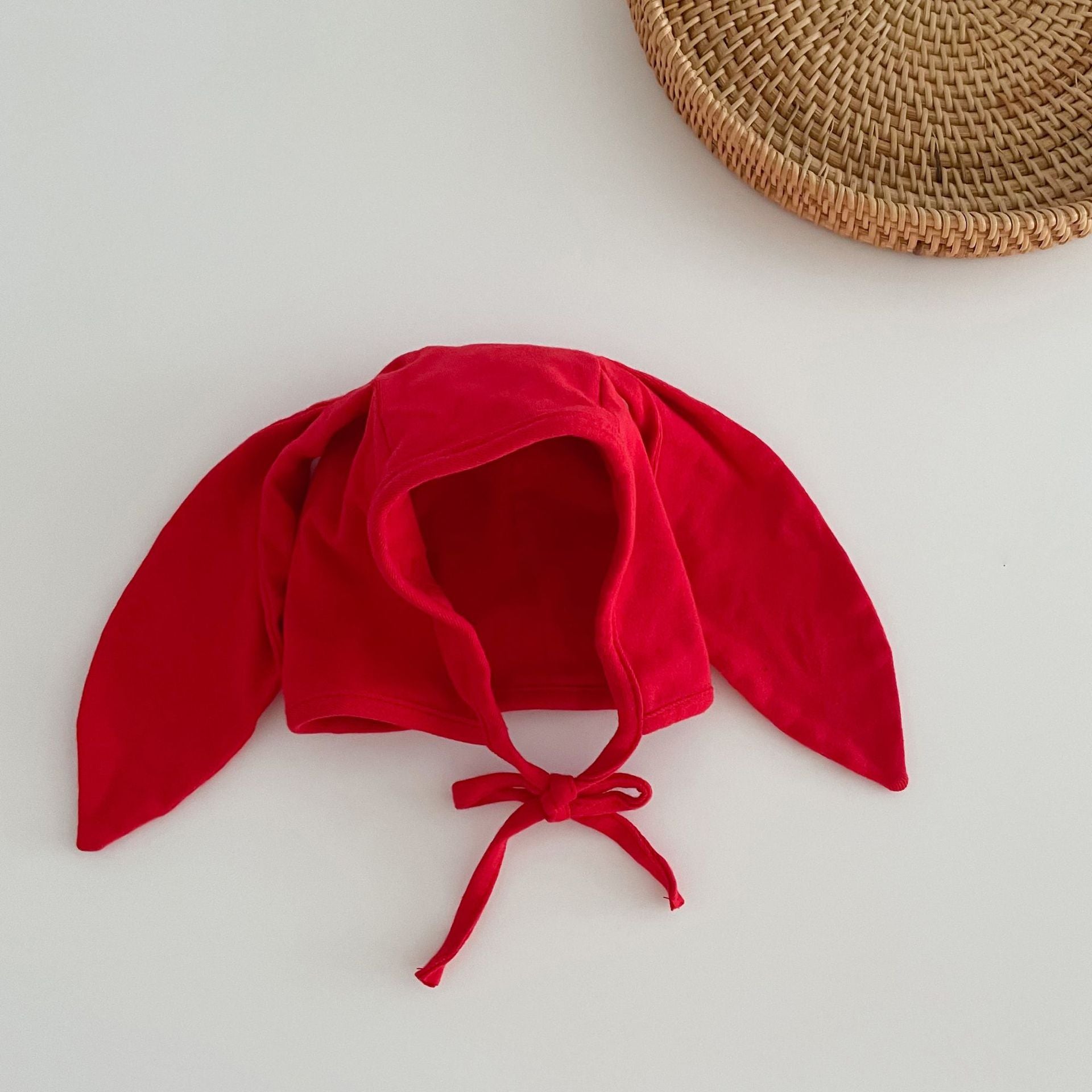 Adorable Autumn Rabbits Design Hat for Baby with tie straps, available in various colors, made from soft cotton blend material.