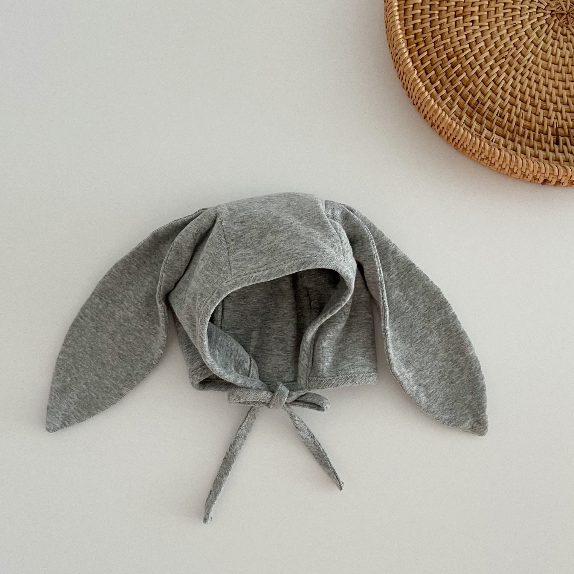 Adorable Autumn Rabbits Design Hat for Baby with tie straps, available in various colors, made from soft cotton blend material.