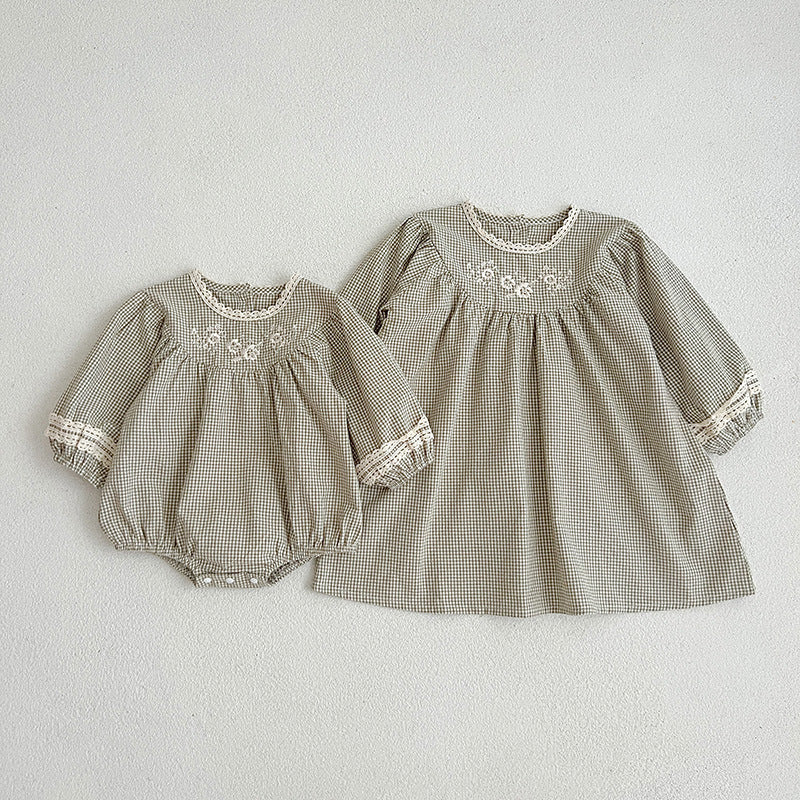 A vintage style dress and onesies in green and light green with floral embroidery, perfect for autumn wear for baby girls.