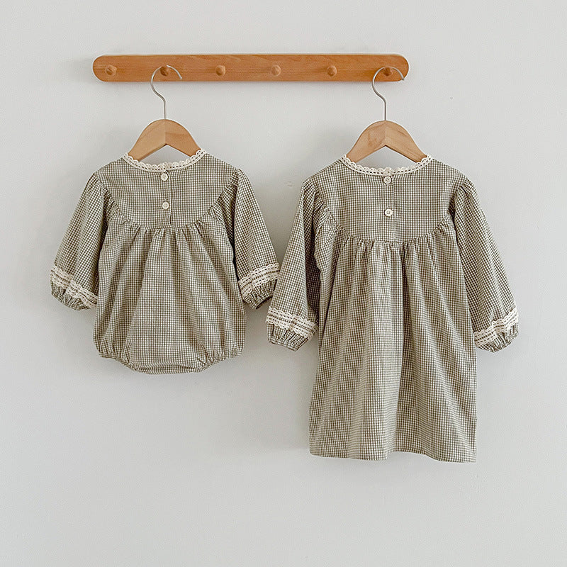 A vintage style dress and onesies in green and light green with floral embroidery, perfect for autumn wear for baby girls.