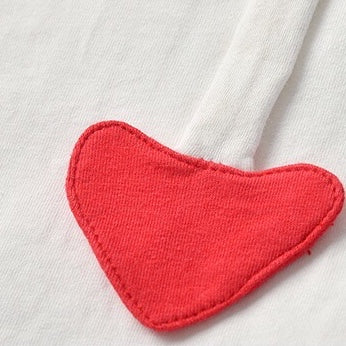 A stylish Baby Bow Tie Patched Onesie Bodysuit in vibrant colors, featuring a bow tie and patchwork design, perfect for special occasions.