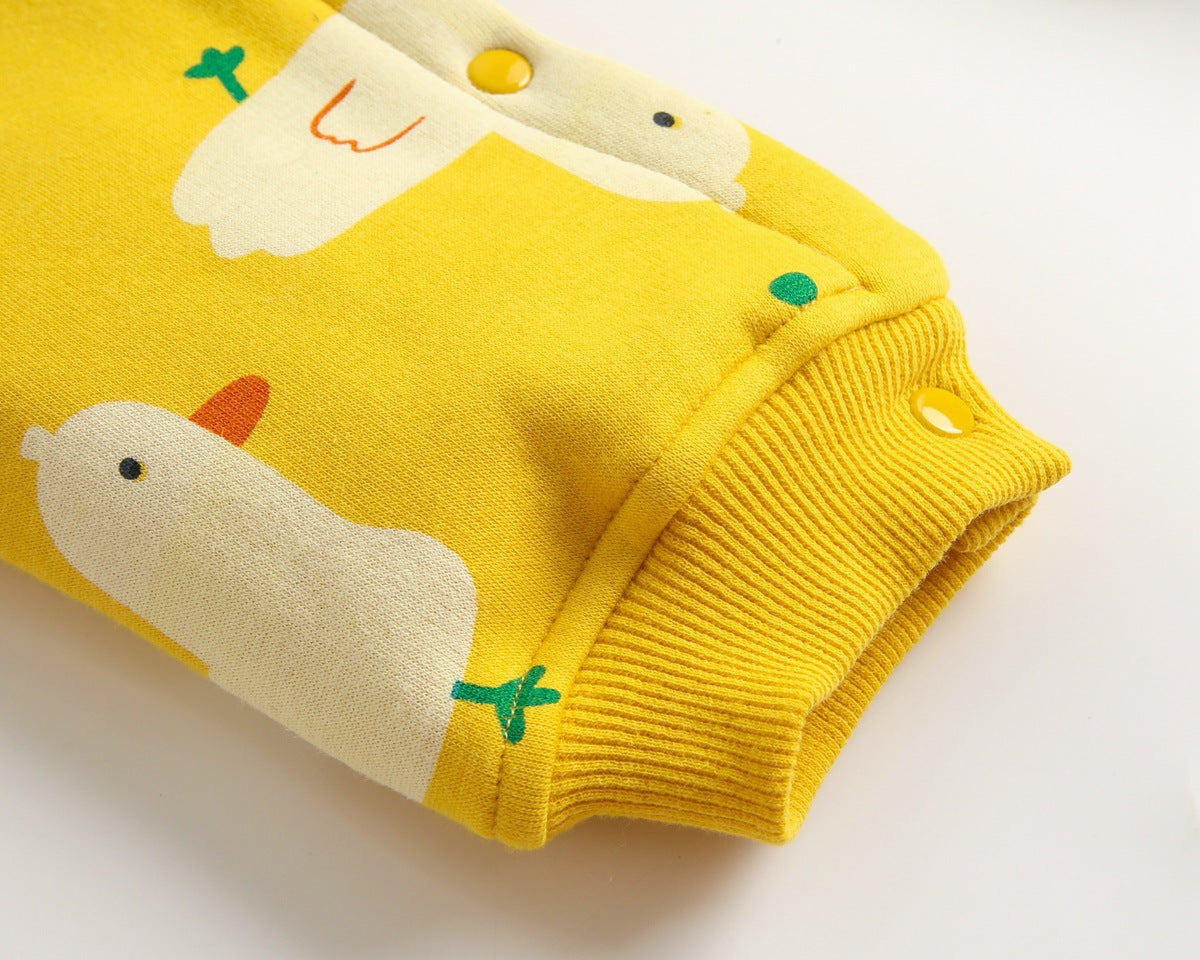 Baby wearing a cute cartoon duck print romper with matching hat, showcasing vibrant colors and playful design.