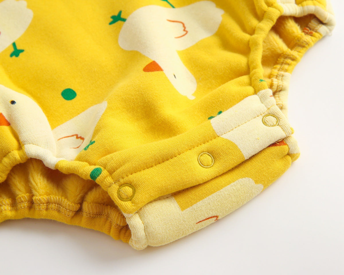 Baby wearing a cute cartoon duck print romper with matching hat, showcasing vibrant colors and playful design.