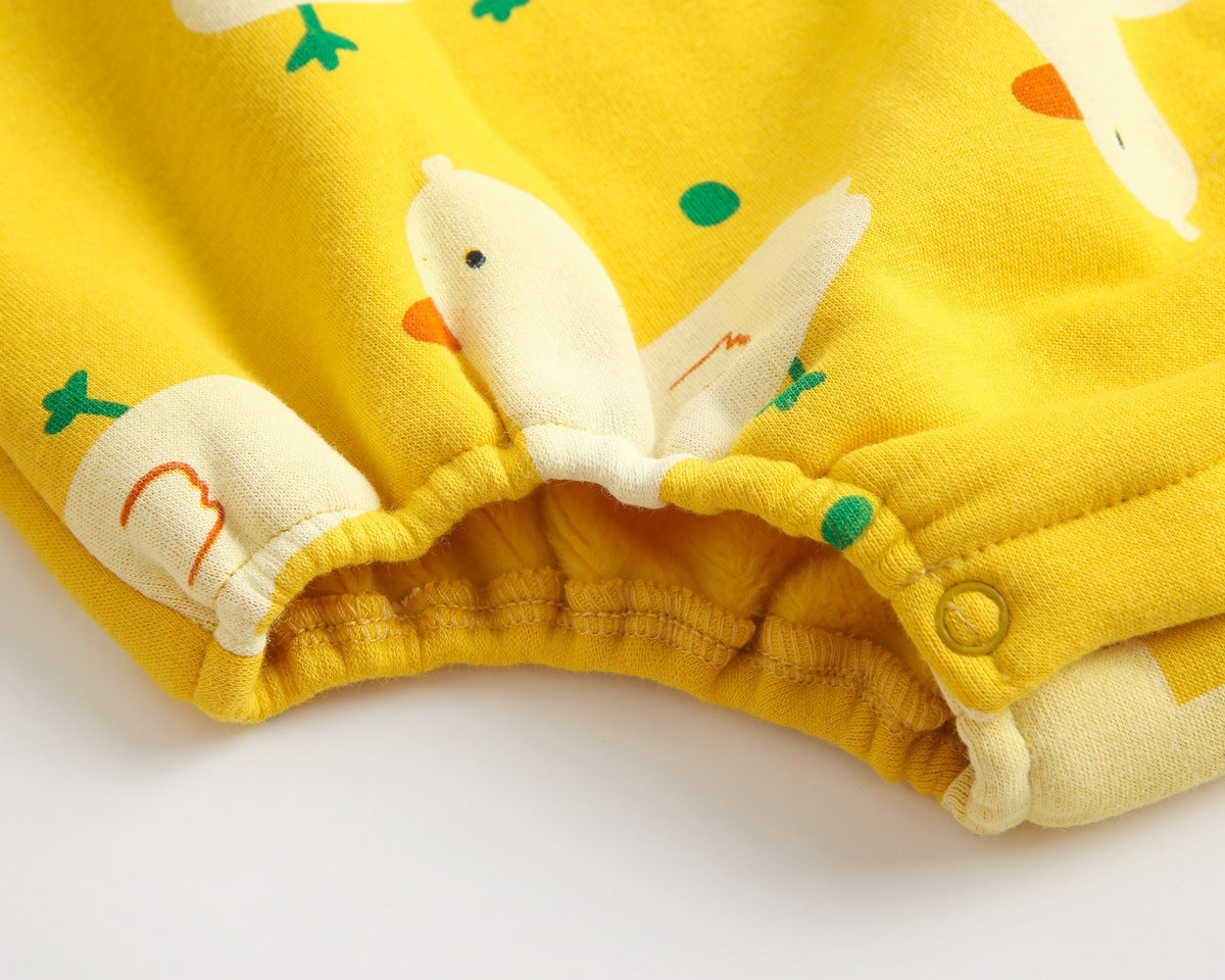Baby wearing a cute cartoon duck print romper with matching hat, showcasing vibrant colors and playful design.