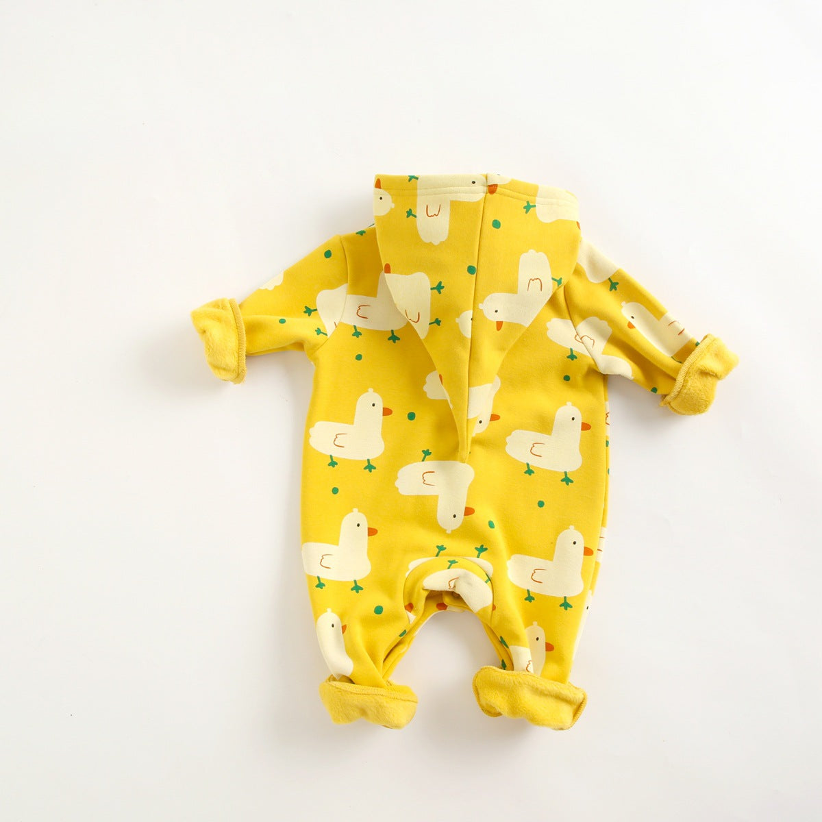 Baby wearing a cute cartoon duck print romper with matching hat, showcasing vibrant colors and playful design.