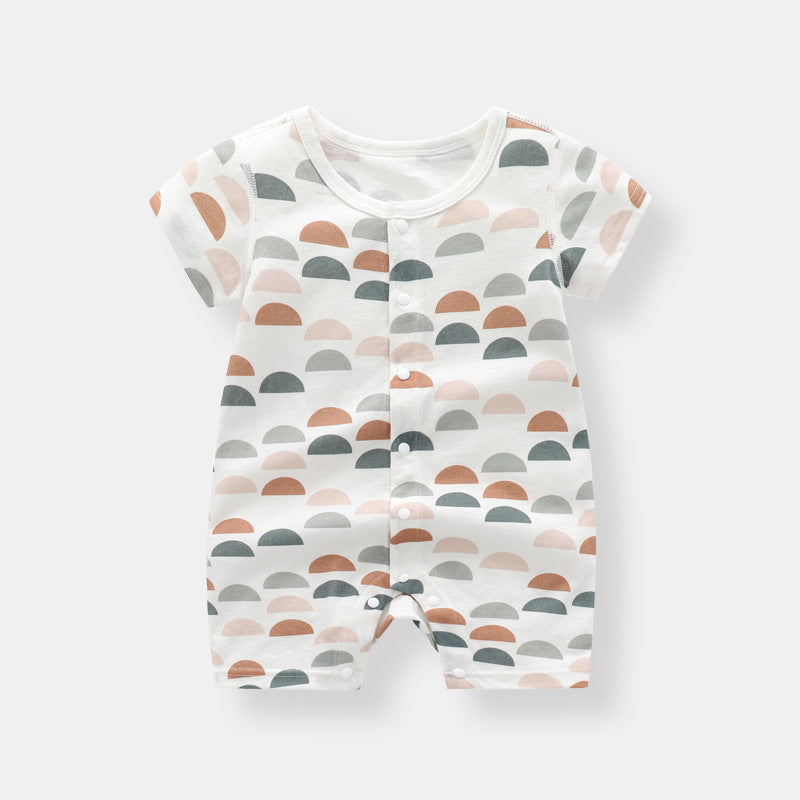 Baby wearing a soft bamboo rabbit graphic jumpsuit in white, showcasing a playful design perfect for summer.