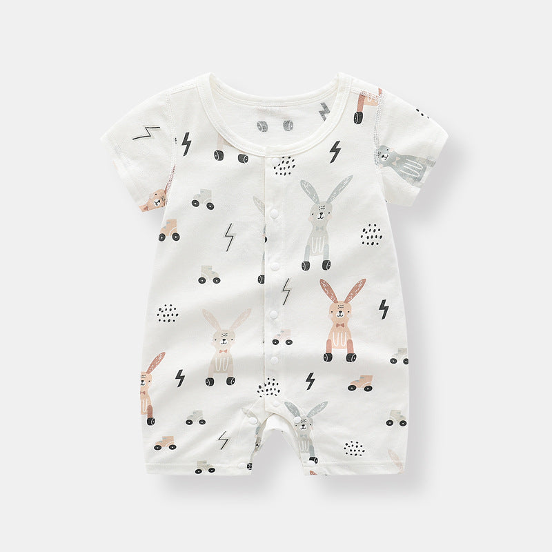 Baby wearing a soft bamboo rabbit graphic jumpsuit in white, showcasing a playful design perfect for summer.