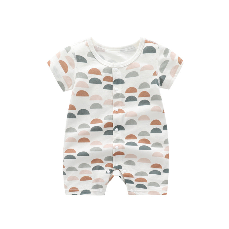 Baby wearing a soft bamboo rabbit graphic jumpsuit in white, showcasing a playful design perfect for summer.