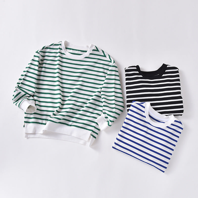 A cozy baby hoodie featuring a striped pattern, long sleeves, and a roomy hood, available in black, blue, and green colors.