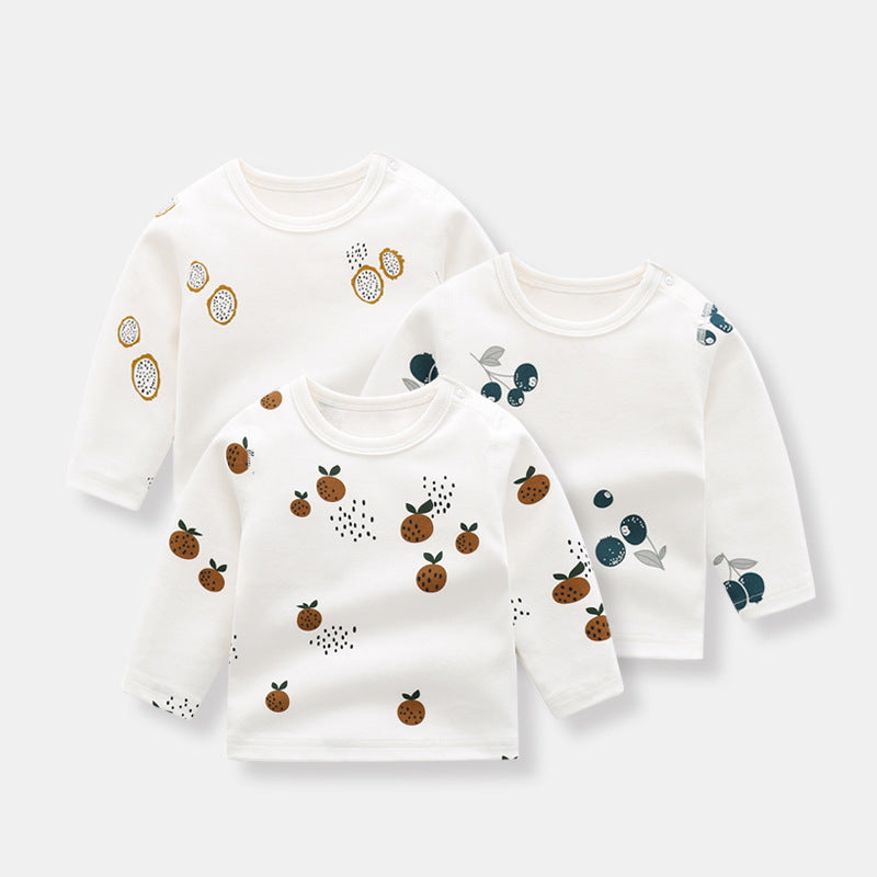 Baby Allover Fruit Graphic top made of 100% organic cotton with side snap buttons, featuring colorful fruit designs.