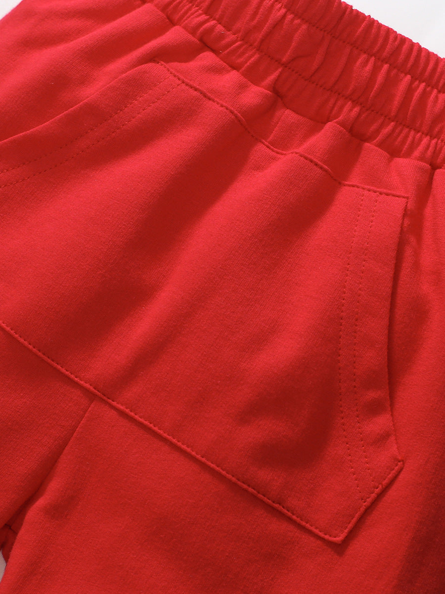 Baby and kids boys casual outfit featuring a whale cartoon design in navy blue, consisting of a short sleeves top and matching shorts.