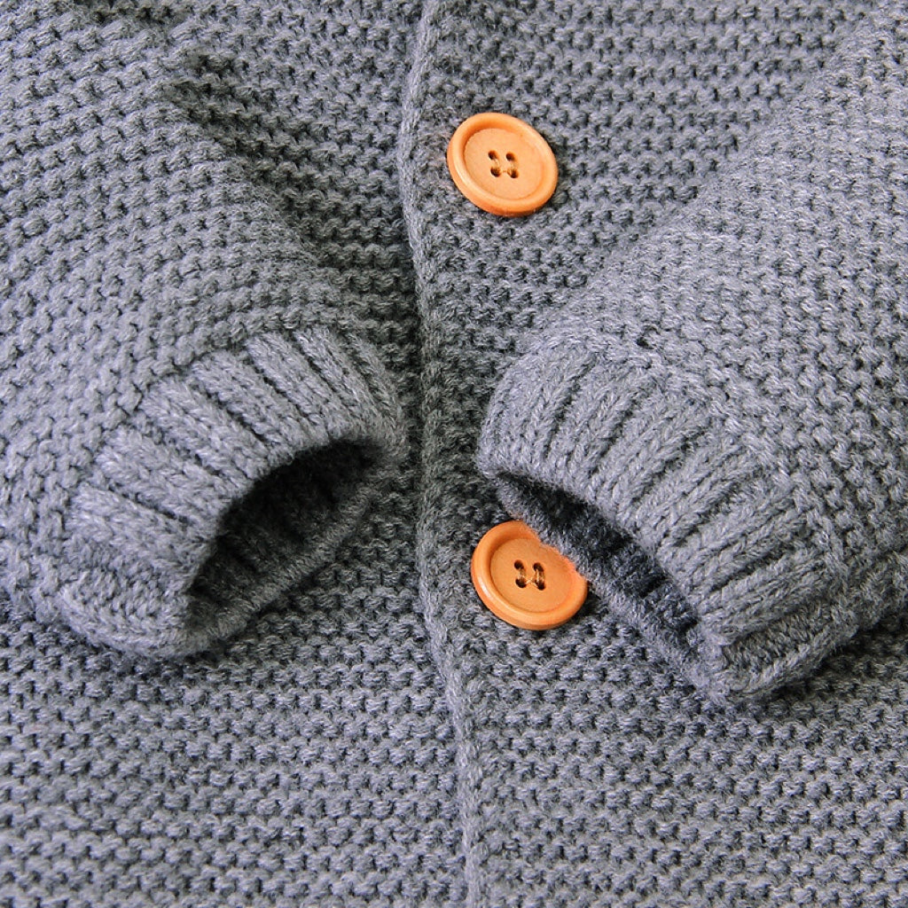 Baby Baby Cable Knitted Pattern Long Sleeve Romper and Hat in white and grey, featuring a button front design for easy dressing.