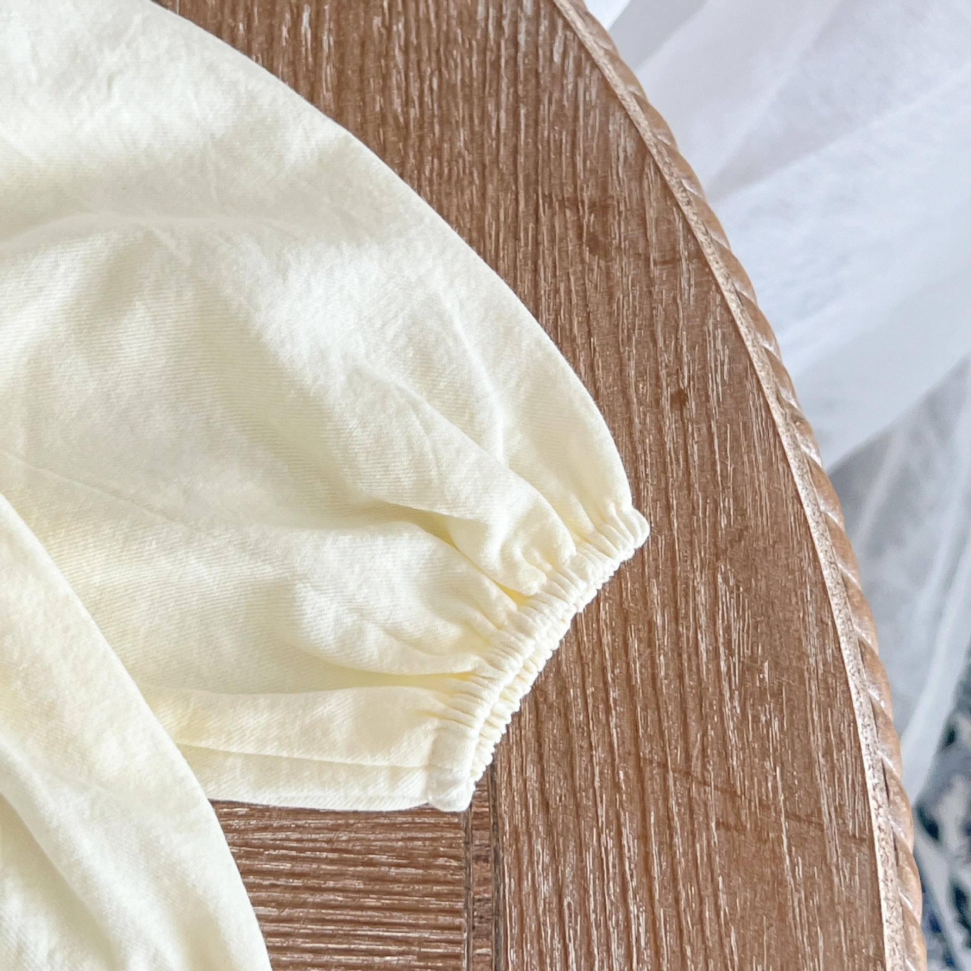 Baby Bear Embroidered Pattern Sailor Collar Long Onesie in apricot color, featuring a cute bear design and stylish collar.