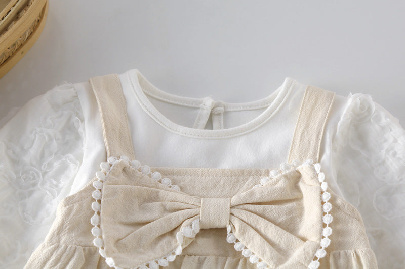 Baby Bow Patched Design Long Sleeve Onesies in white, featuring a delicate bow and soft cotton fabric, perfect for baby girls.