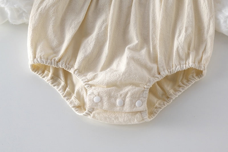 Baby Bow Patched Design Long Sleeve Onesies in white, featuring a delicate bow and soft cotton fabric, perfect for baby girls.