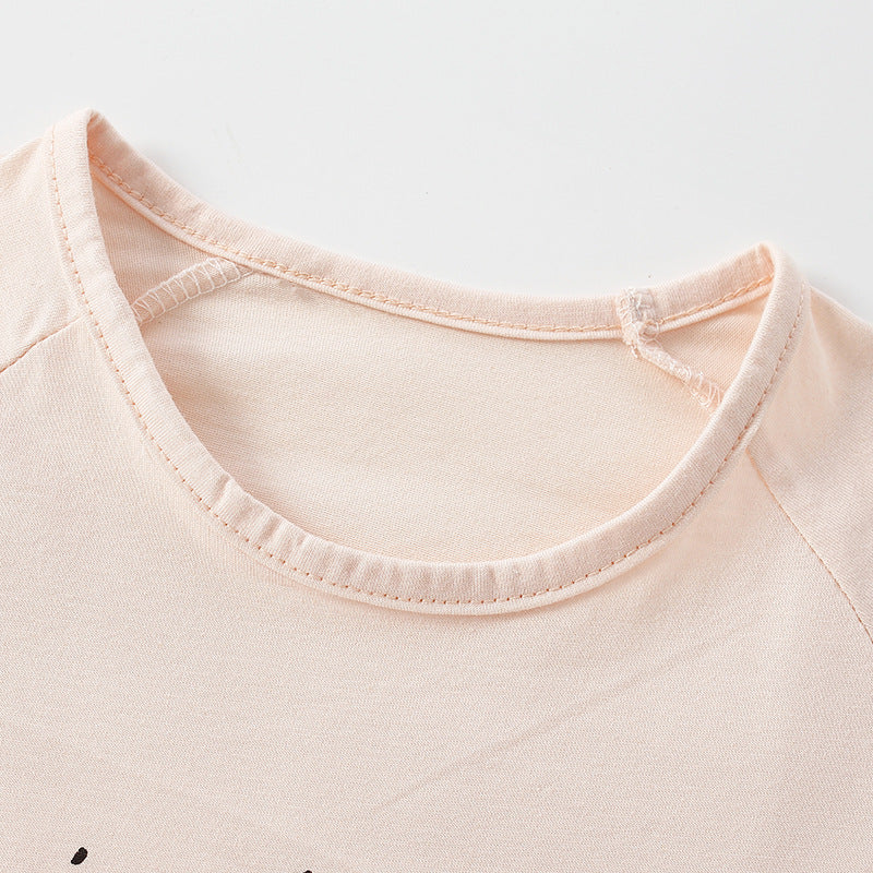 Baby boy and girl soft cotton O-neck shirt featuring a playful bread pattern in pink color, suitable for all seasons.