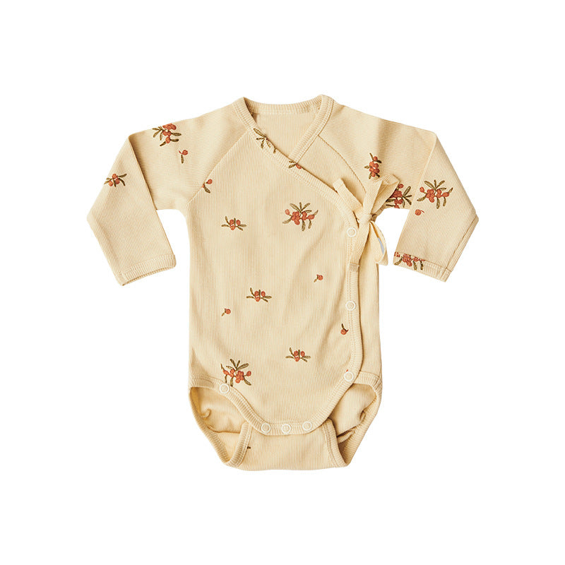 Baby boy and girl onesie featuring a floral pattern and side belt design, made from soft cotton fabric.