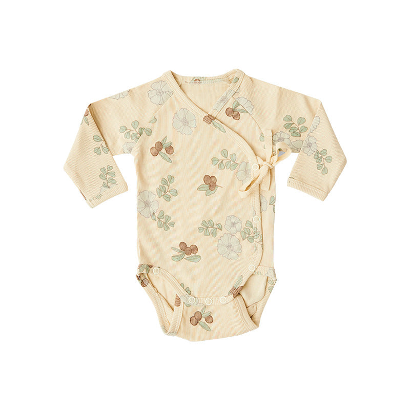 Baby boy and girl onesie featuring a floral pattern and side belt design, made from soft cotton fabric.