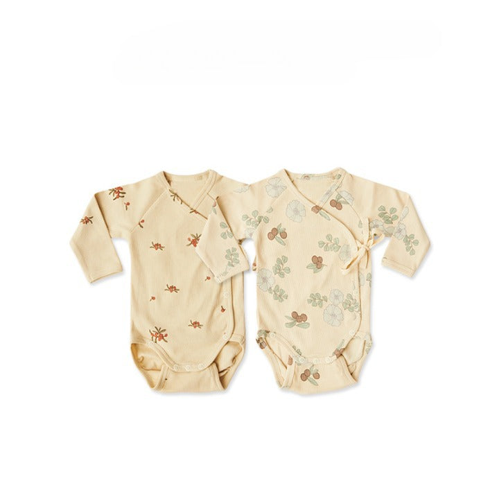 Baby boy and girl onesie featuring a floral pattern and side belt design, made from soft cotton fabric.