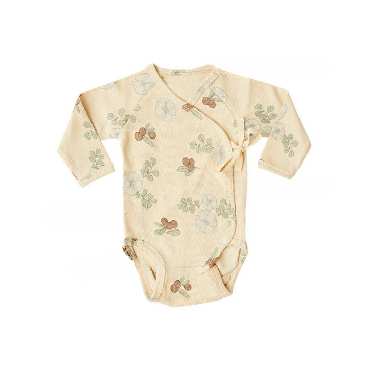 Baby boy and girl onesie featuring a floral pattern and side belt design, made from soft cotton fabric.