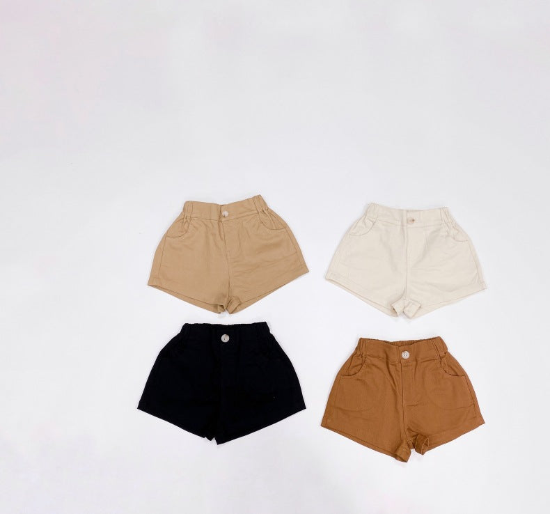 Baby boy and girl solid color denim shorts with pockets, available in white, black, khaki, and brown, perfect for summer wear.