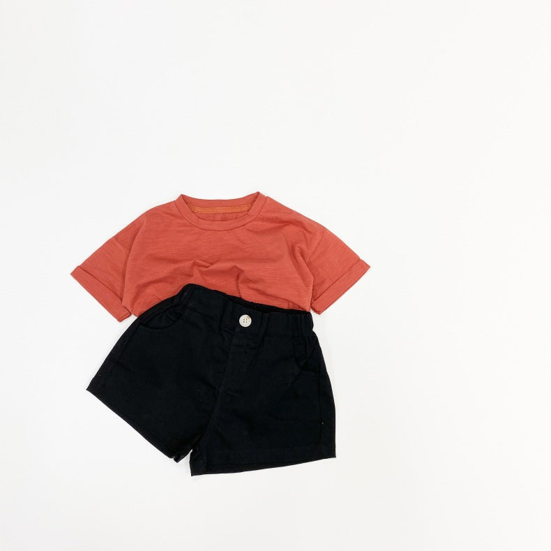 Baby boy and girl solid color denim shorts with pockets, available in white, black, khaki, and brown, perfect for summer wear.