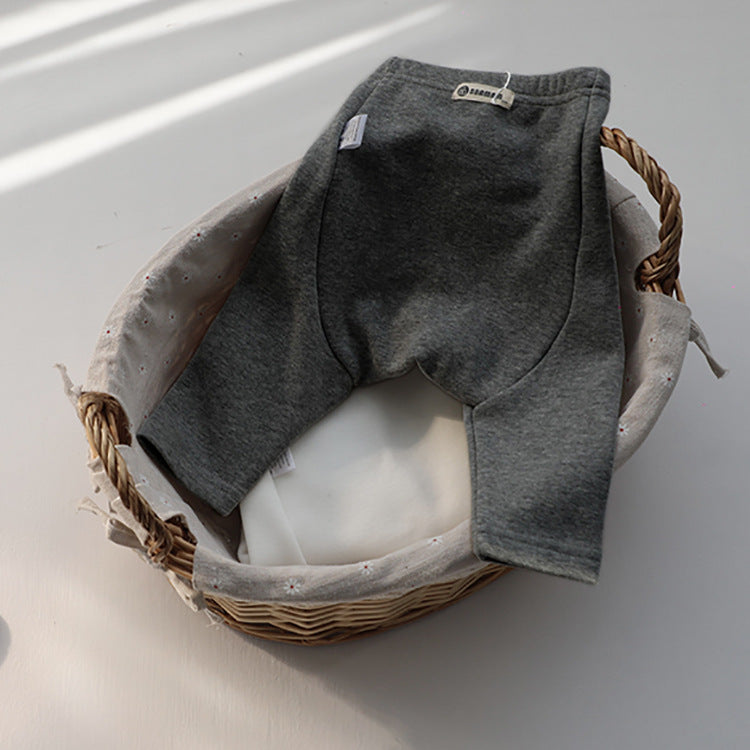 Baby boy and girl solid color fleece thickened winter pants in various colors, showcasing soft fleece lining and comfortable fit for infants.