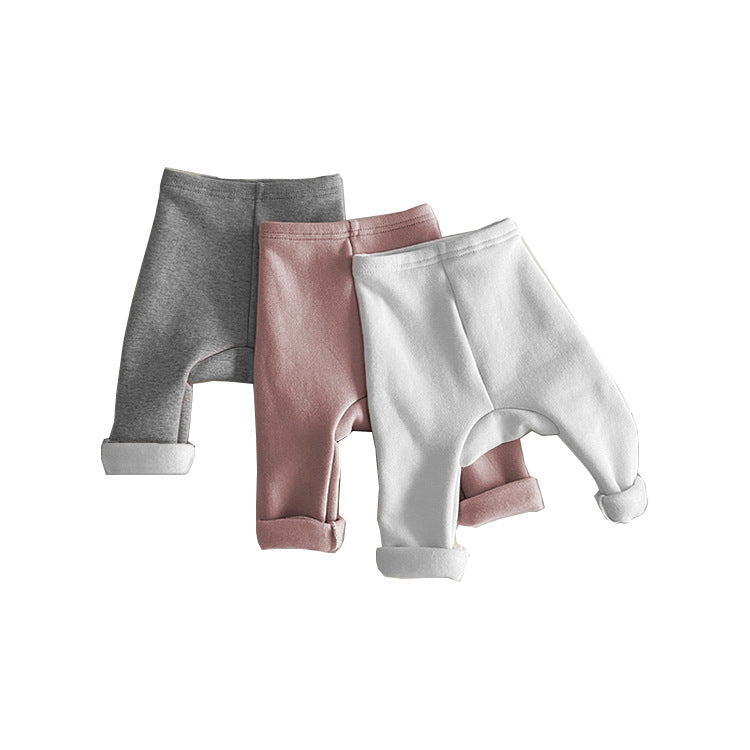 Baby boy and girl solid color fleece thickened winter pants in various colors, showcasing soft fleece lining and comfortable fit for infants.