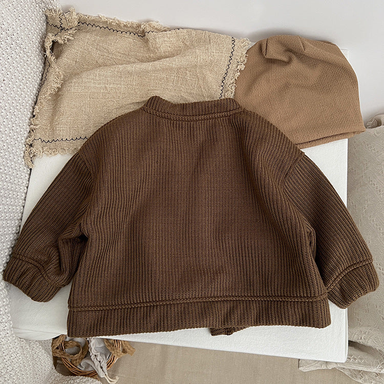 Baby boy and girl solid color thermal jacket with V-neck and single-breasted design in brown, perfect for autumn and winter wear.