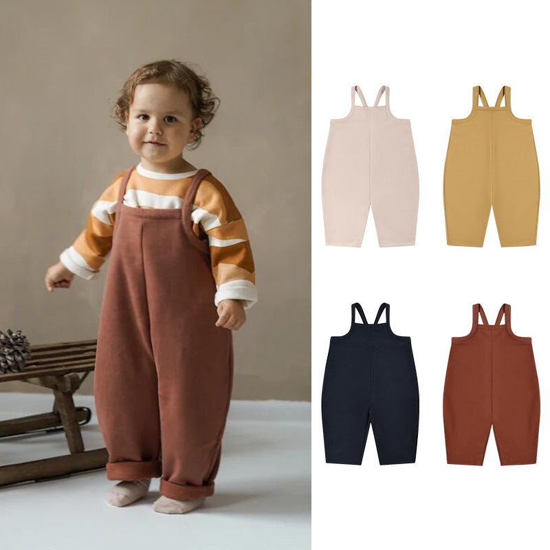 Baby boy and girl solid color romper in vibrant colors, showcasing a loose and comfy design suitable for infants.