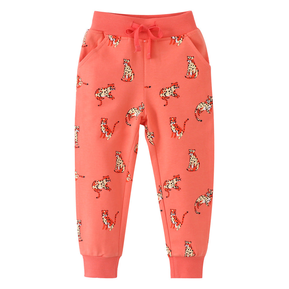 Baby boy soft cotton trousers featuring a cartoon animal pattern in vibrant orange color, perfect for playful days.