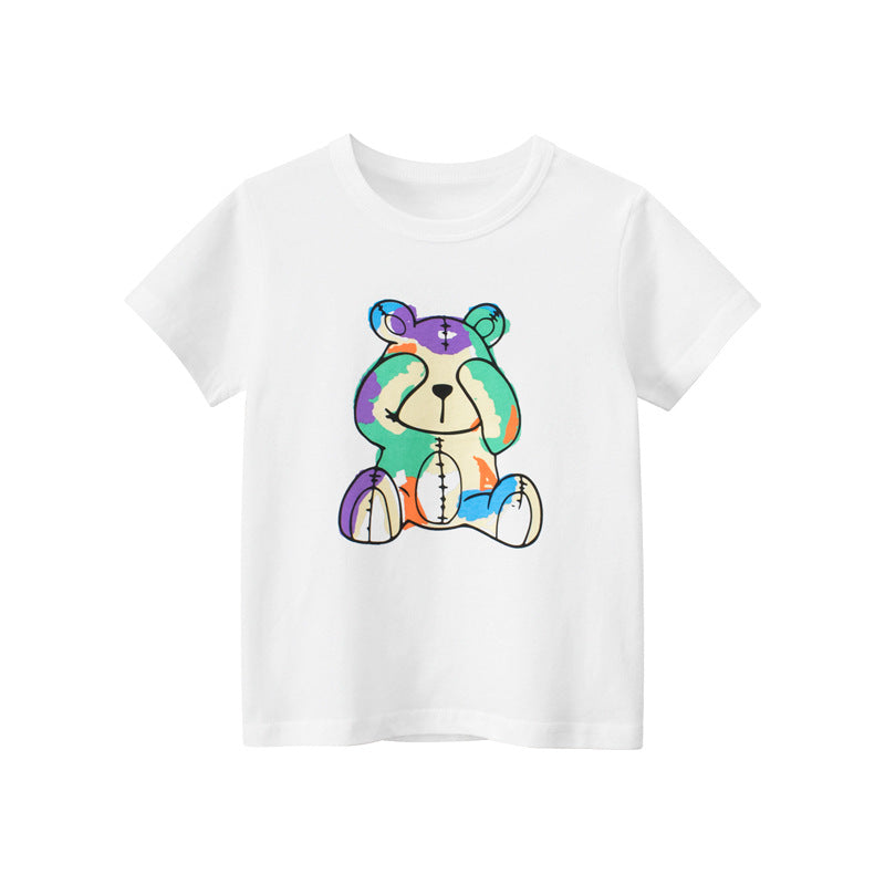 Baby boy wearing a soft cotton tee with a cartoon bear graphic, available in white and black colors.