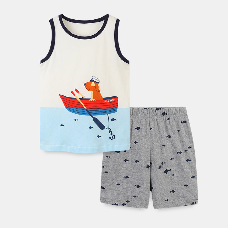 Baby boy wearing a sleeveless summer set featuring a cartoon dog graphic, made of soft cotton, perfect for warm weather.