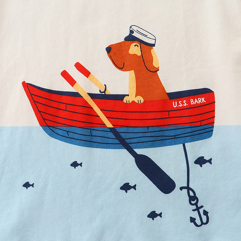 Baby boy wearing a sleeveless summer set featuring a cartoon dog graphic, made of soft cotton, perfect for warm weather.