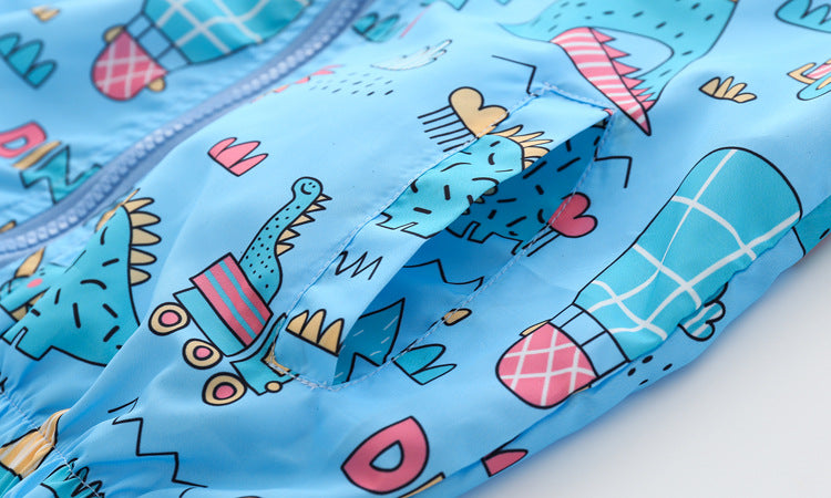 Baby boy wearing a cartoon pattern zipper front mesh cloth jacket coat in various colors, showcasing its playful design and comfortable fit.