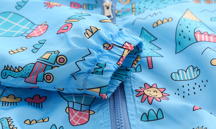 Baby boy wearing a cartoon pattern zipper front mesh cloth jacket coat in various colors, showcasing its playful design and comfortable fit.