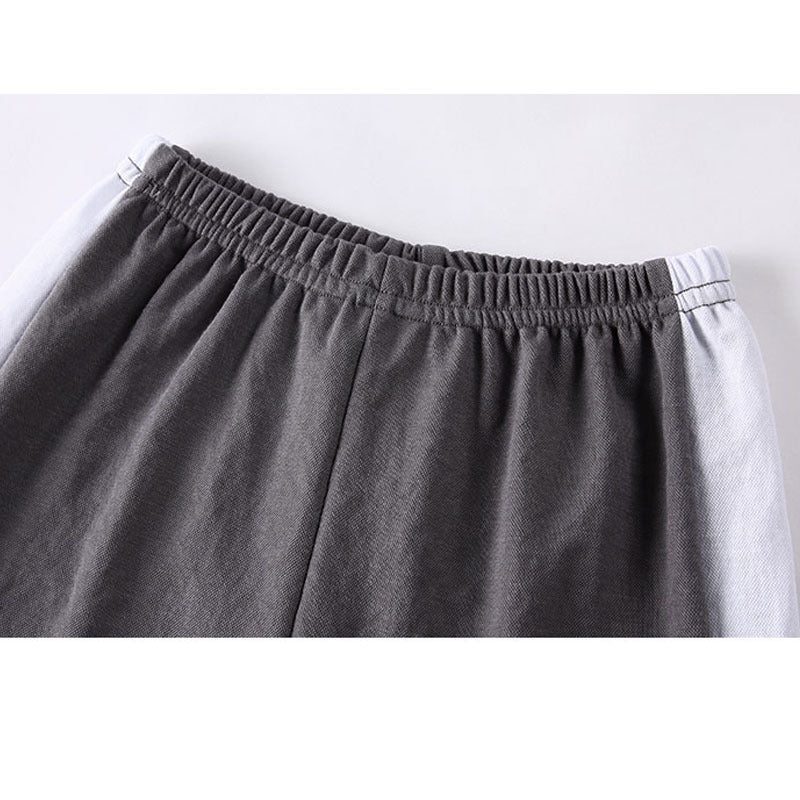 Baby boy long pants featuring a colorful cartoon print pattern, made from lightweight cotton fabric, perfect for summer wear.